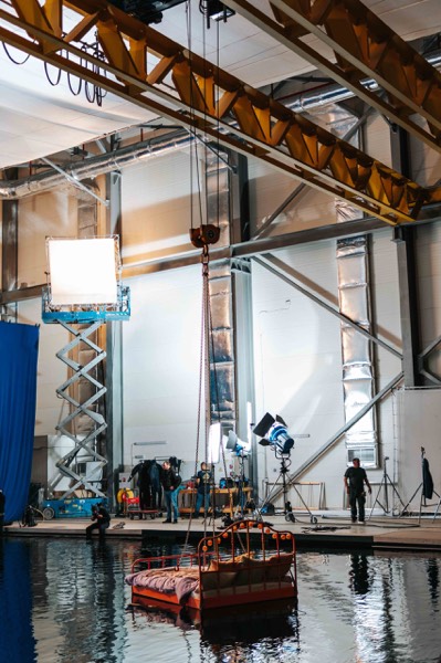 A boat set under studio lighting