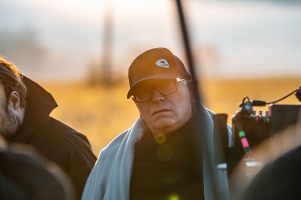Director looking at the monitor on an outdoor shoot
