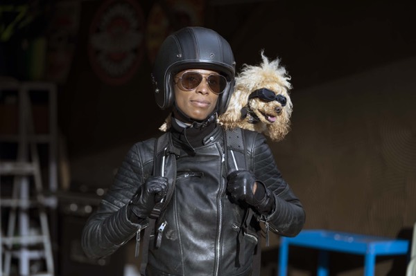 Actors in leather jackets and helmets on set