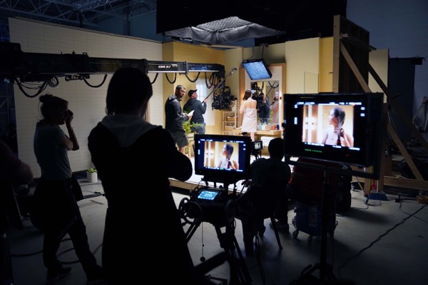 The monitors and crew during a take in a studio