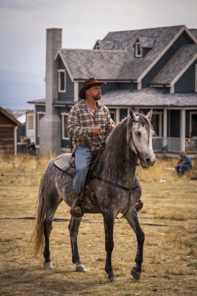 Cowboy on a horse on a western set