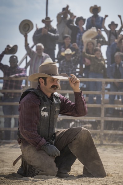 Rodeo arena scene with an audience