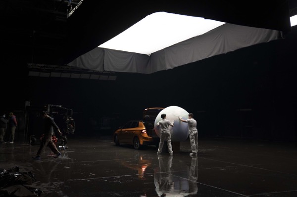 Studio with a lighting ceiling and crew